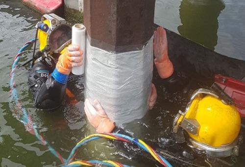Bekleden van buispalen van de Vesta Terminal met STOPAQ anti-corrosie coating 